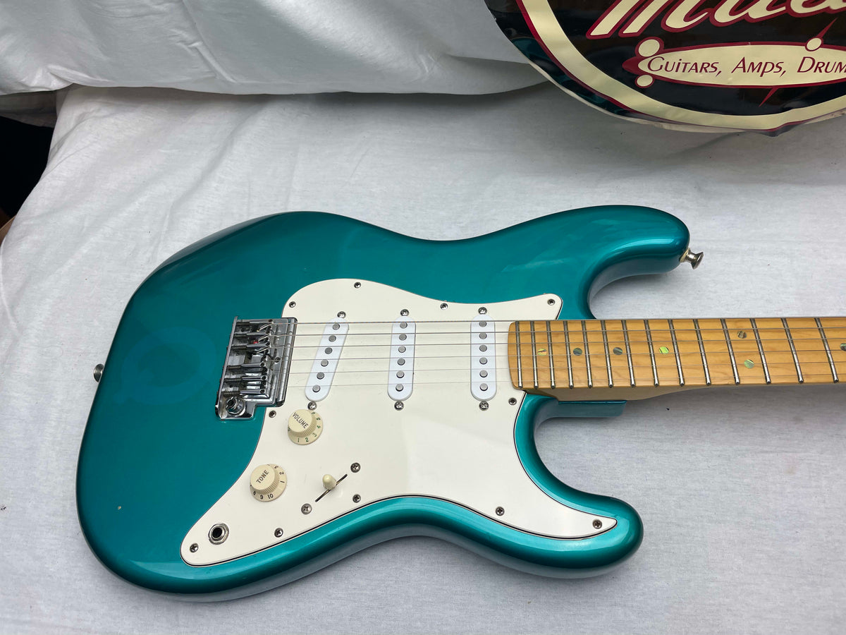 Fender PARTS Stratocaster - 1999 American Deluxe neck on 1983 Dan Smith-era Standard Strat body with Case - Transparent Teal